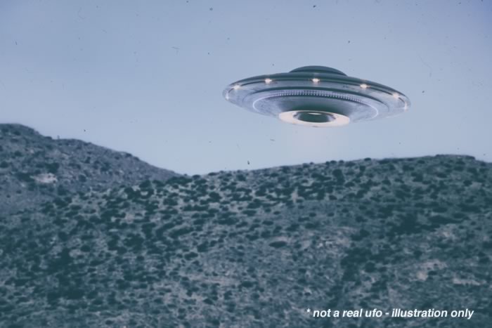 Illustration of a UFO in the desert.